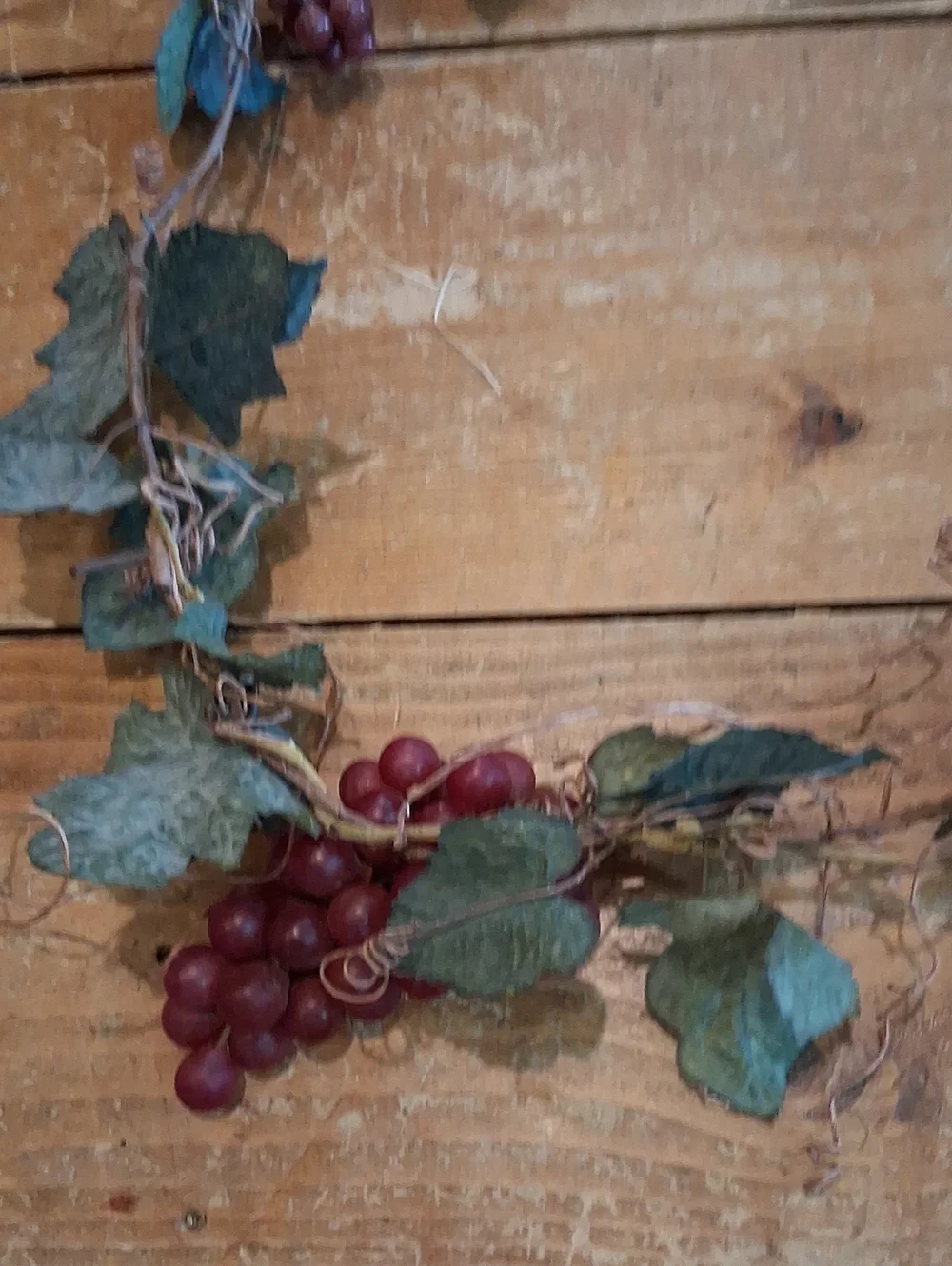 Botanical‎ grape leaf and fruit garland featuring faux clusters of grapes